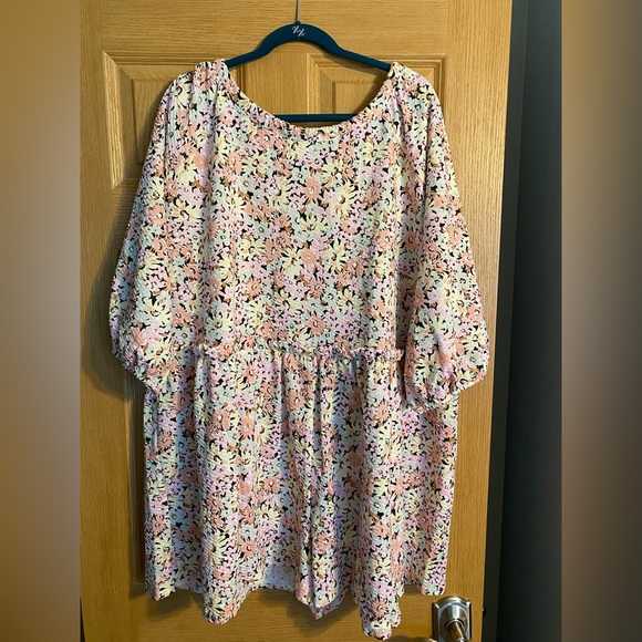 ASOS DESIGN high neck textured smock romper in smudge floral- Oversized - Picture 1 of 8